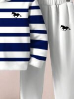 ⁦طقم أولاد قطعتين  تصميم فضفاض وطبعات ملونة⁩ - الصورة ⁦31⁩